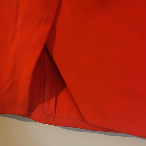 Beautiful mini skirt in a burnt orange with the front slit - Picture 3 of 6